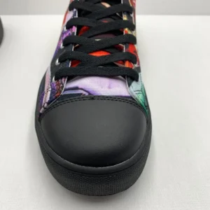 Paul Corps custom printed high-top canvas shoe featuring a vibrant, abstract cityscape design in bold colors with black laces and sole. Showing Toe of left shoe.