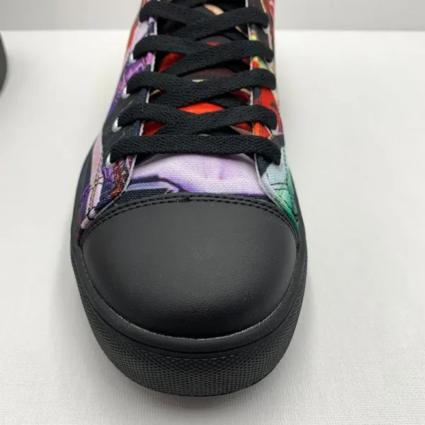 Paul Corps custom printed high-top canvas shoe featuring a vibrant, abstract cityscape design in bold colors with black laces and sole. Showing Toe of left shoe.