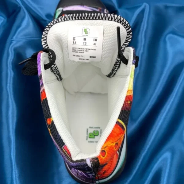Paul Corps custom printed high-top canvas shoe featuring a vibrant, abstract cityscape design in bold colors with black laces and sole. Showing inside care tag and Branded logo.