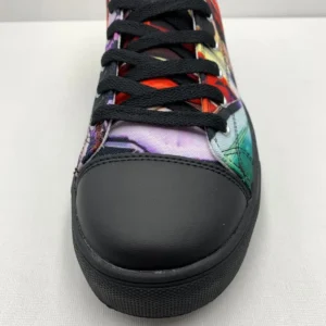 Paul Corps custom printed high-top canvas shoe featuring a vibrant, abstract cityscape design in bold colors with black laces and sole. Showing Toe of right shoe.
