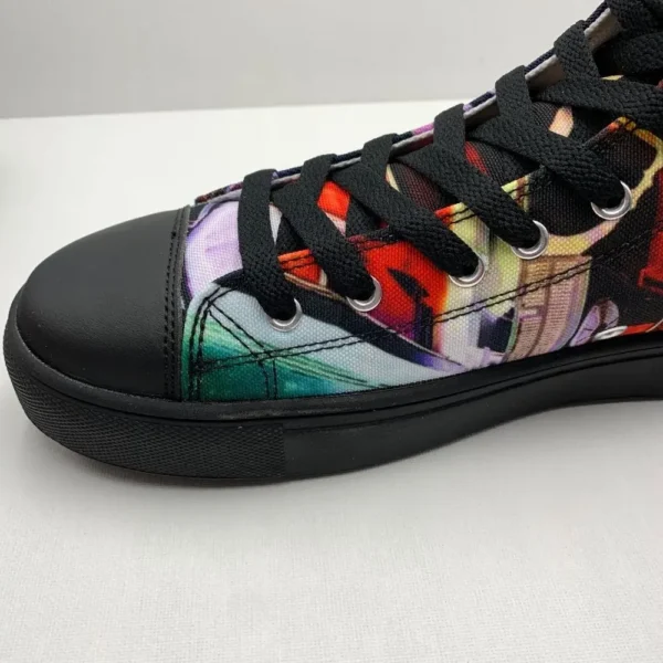 Paul Corps custom printed high-top canvas shoe featuring a vibrant, abstract cityscape design in bold colors with black laces and sole. Showing Toe and outside sole side of shoe.