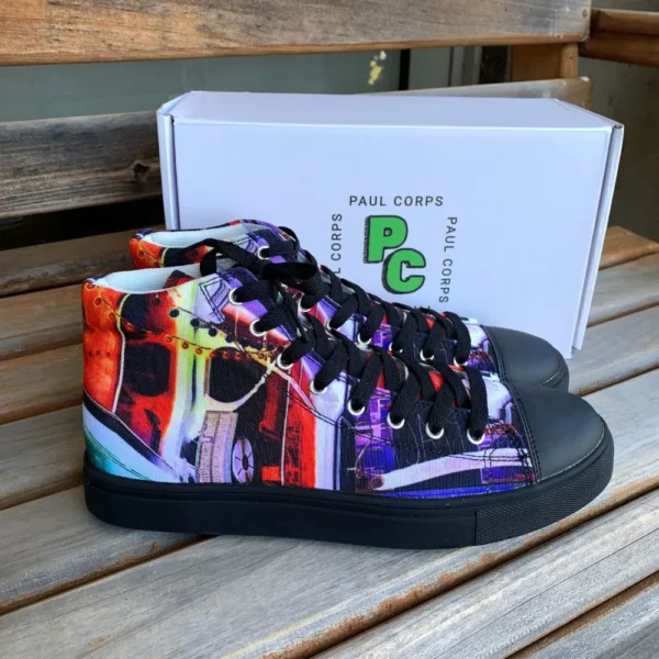 Paul Corps custom printed high-top canvas shoe featuring a vibrant, abstract cityscape design in bold colors with black laces and sole. With Branded Paul Corps Shoe Box