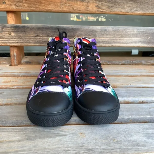 Paul Corps custom printed high-top canvas shoe featuring a vibrant, abstract cityscape design in bold colors with black laces and sole. With shoes facing frontwards.