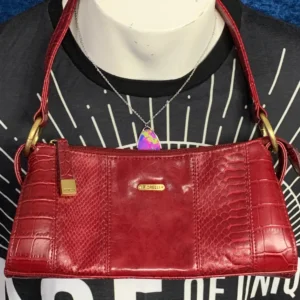 Vintage Fiorelli red baguette shoulder bag with croc-embossed vegan leather and gold hardware, styled on a neutral background.