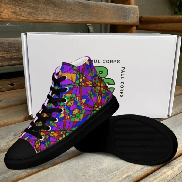 A pair of Paul Corps high-top canvas shoes featuring a bold, multicolored stained glass effect pattern with intersecting lines in purple, orange, green, blue, and red, set against black soles and laces. The shoes are displayed in front of a white Paul Corps branded box on a wooden surface.