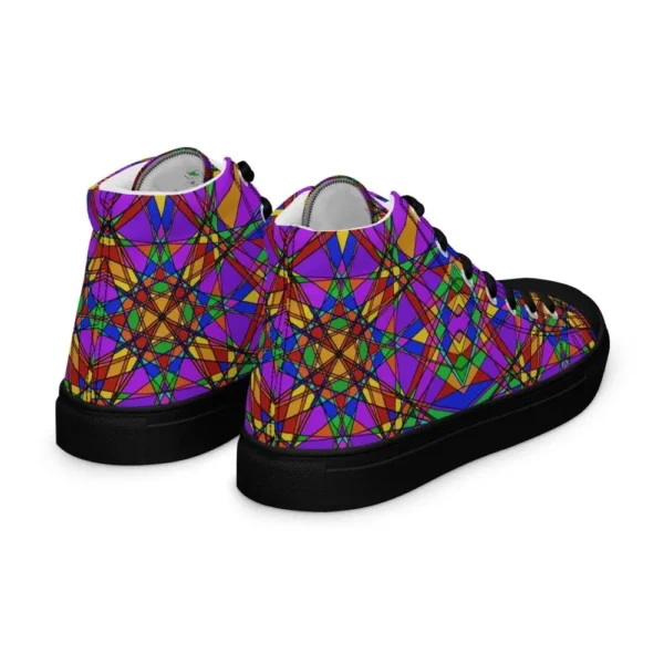 A pair of Paul Corps high-top canvas shoes featuring a bold, multicolored stained glass effect pattern with intersecting lines in purple, orange, green, blue, and red, set against black soles and laces. The shoes are viewed from behind.