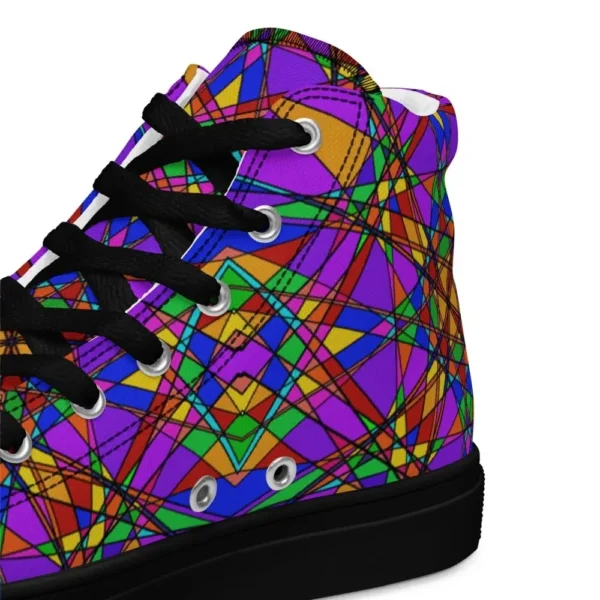 A pair of Paul Corps high-top canvas shoes featuring a bold, multicolored stained glass effect pattern with intersecting lines in purple, orange, green, blue, and red, set against black soles and laces. This is showing the back part of the shoe.