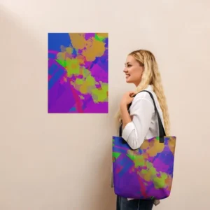 A person wearing a Kaleidoscope Dream all-over print tote bag with black handles over their shoulder, standing in front of a matching abstract art print on a beige wall