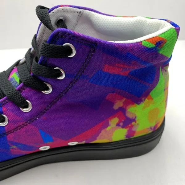 A pair of Paul Corps Kaleidoscope Dream High Top Canvas Shoes featuring a vibrant, abstract pattern in purple, blue, green, and orange, with black laces and black soles, displaying back of shoe
