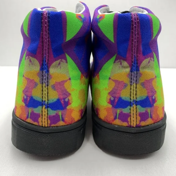 A pair of Paul Corps Kaleidoscope Dream High Top Canvas Shoes featuring a vibrant, abstract pattern in purple, blue, green, and orange, with black laces and black soles, displaying back of shoe