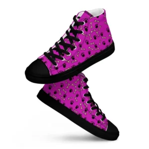 A pair of Paul Corps high-top canvas shoes with a vibrant pink background, decorated with black paw prints and white bone motifs, black laces, and black soles.