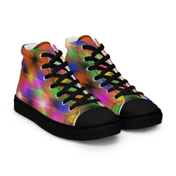 A pair of Paul Corps high-top canvas shoes featuring a bold spray paint-inspired design with vibrant streaks of blue, pink, orange, and yellow, black laces, and black soles.