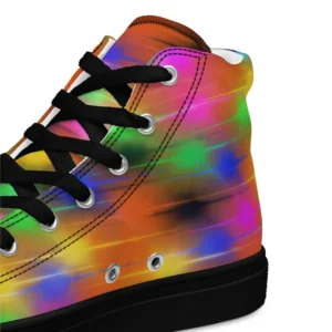 A pair of Paul Corps high-top canvas shoes featuring a bold spray paint-inspired design with vibrant streaks of blue, pink, orange, and yellow, black laces, and black soles.