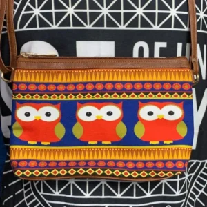 Colourful owl sling bag from All Things Sundar with intricate Indian-inspired design on beige canvas.